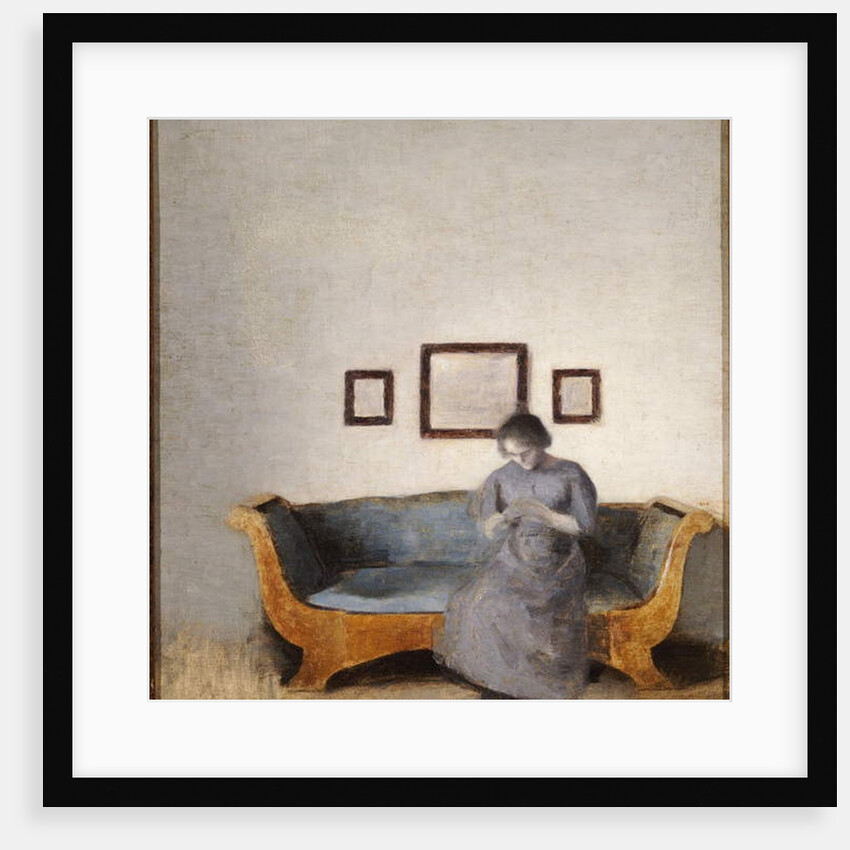 Ida Hammershoi sitting on a sofa by Vilhelm Hammershoi