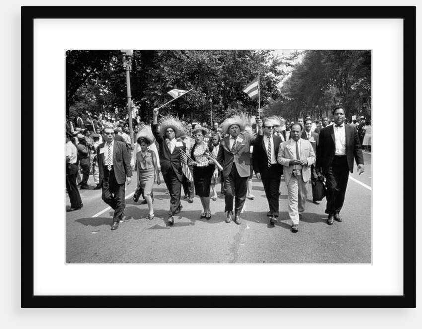 The March on Washington: Marchers Wearing Hats Carry Puerto Rican Flags Down Constitution Avenue, 29th August 1963 by Nat Herz