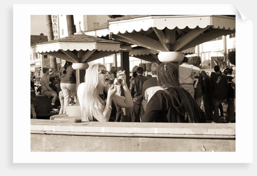 Woman with a pierced tongue applying lipstick, 2004 by Stephen Spiller