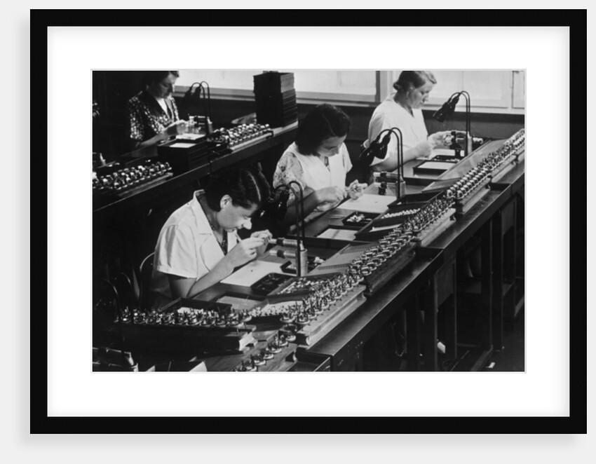 Assembly line for television broadcasting equipment at the Telefunken manufacturing plant, Berlin, c.1935 by German Photographer