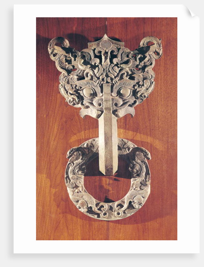 Pu shou' door knocker with a taotie design surmounted by a phoenix and holding a ring with sculpted animals by Chinese School