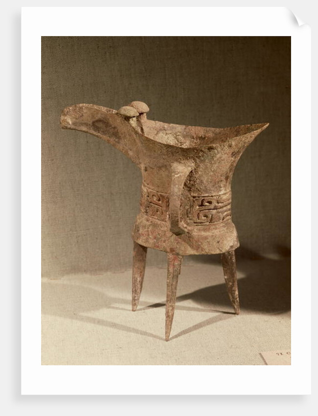 Three-legged 'chueh' vessel for heating wine with a taotie design by School Chinese