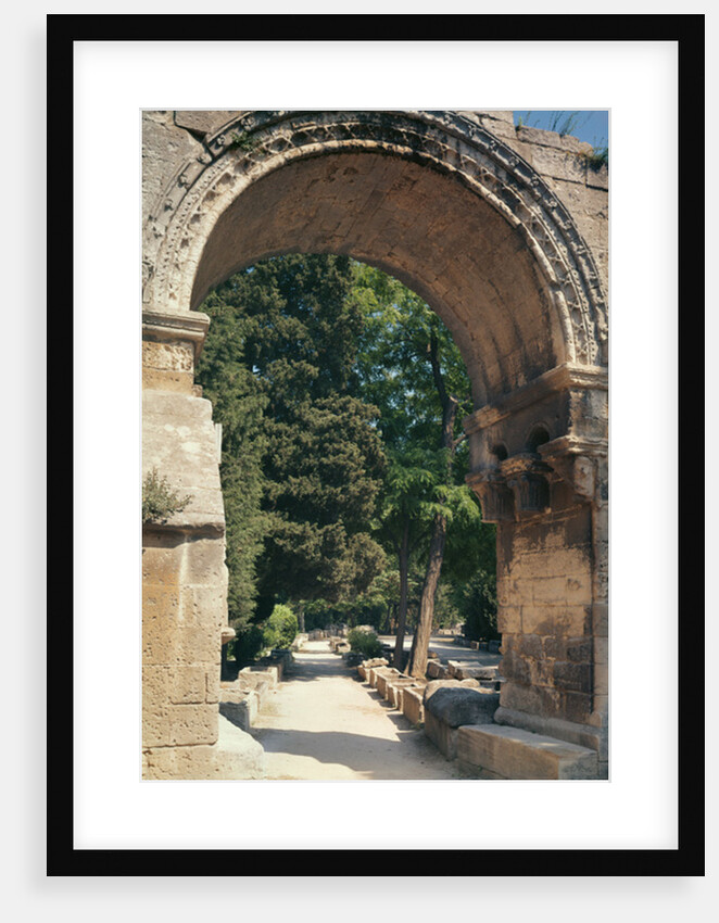 View of the Allee de Sarcophages through the remains of the entrance of the Church of St. Cesaire le Vieux by Anonymous