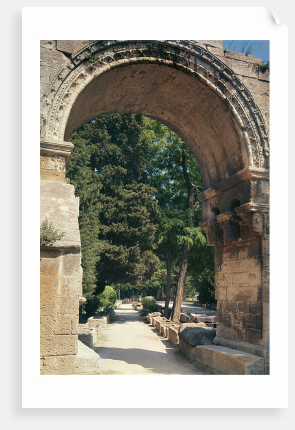 View of the Allee de Sarcophages through the remains of the entrance of the Church of St. Cesaire le Vieux by Anonymous