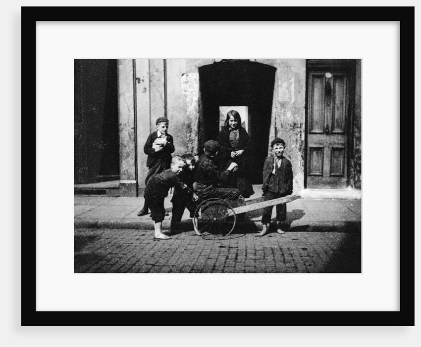 Children in a London slum by English Photographer