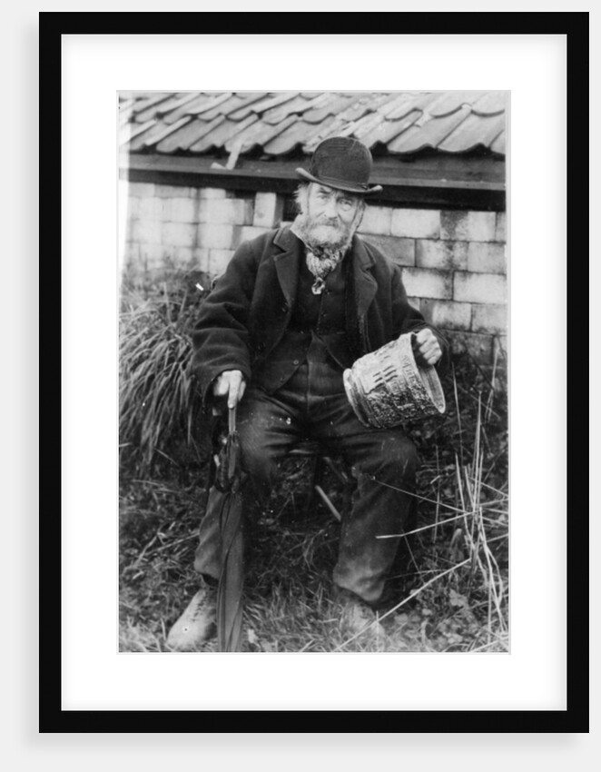 Edward Bingham holding one of his Castle Hedingham Ware designs by English Photographer