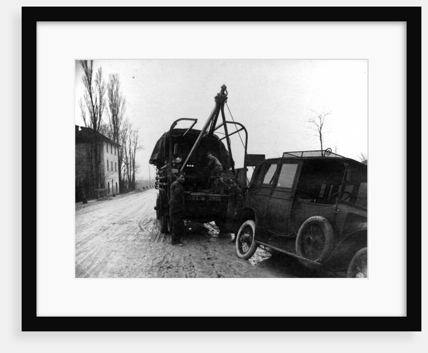 British soldiers towing a motor vehicle in Italy during WWI by English Photographer