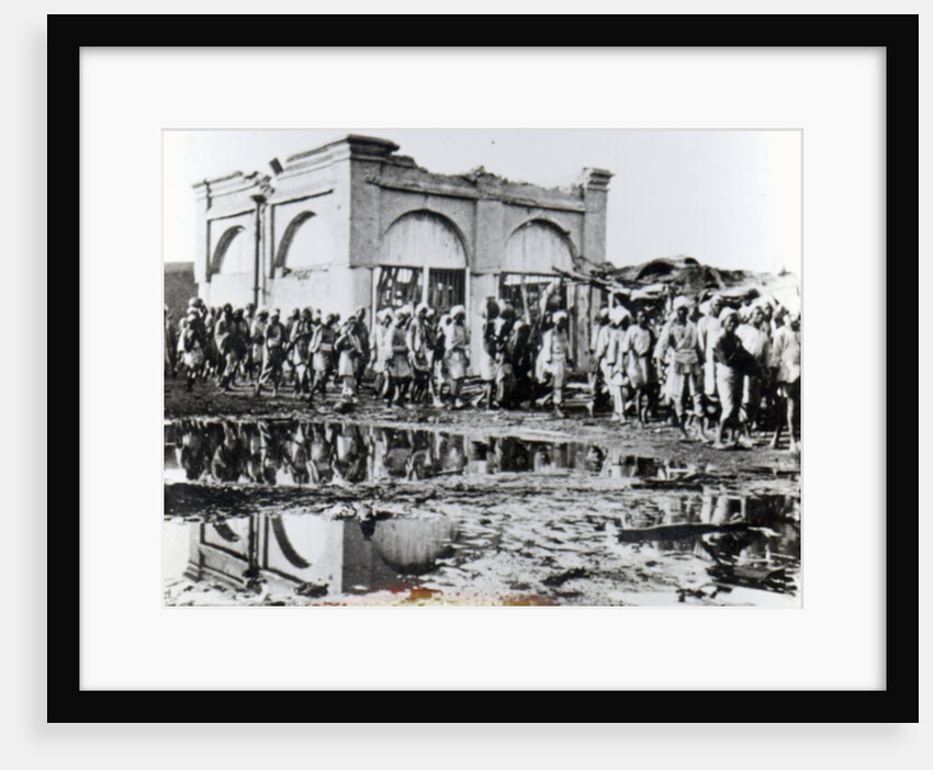 Prisoners passing the 'Mihrab,' the Khalifa's Prayer House, 1898 by English Photographer
