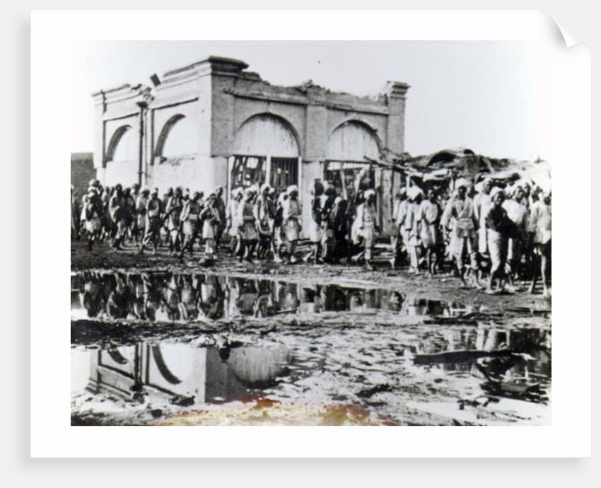 Prisoners passing the 'Mihrab,' the Khalifa's Prayer House, 1898 by English Photographer