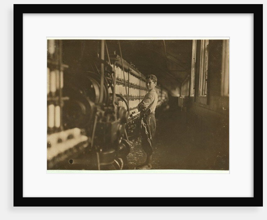 John Dempsey, 11 or 12 years old, Saturday worker in the mule-spinning room at Jackson Mill, Fiskeville, Rhode Island, 1909 by Lewis Wickes Hine