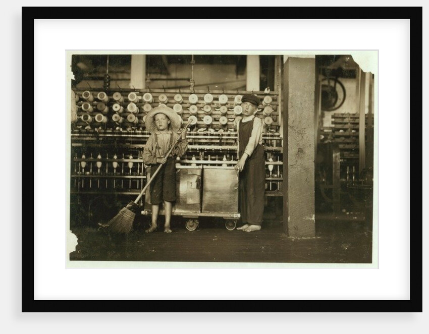 12 year old doffer Ronald Webb and 7 year old Frank Robinson, son of cardroom boss, who sweeps and doffs at Roanoke Cotton Mills, Virginia, 1911 by Lewis Wickes Hine