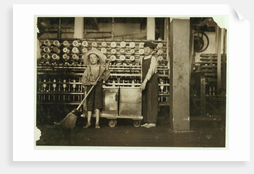 12 year old doffer Ronald Webb and 7 year old Frank Robinson, son of cardroom boss, who sweeps and doffs at Roanoke Cotton Mills, Virginia, 1911 by Lewis Wickes Hine