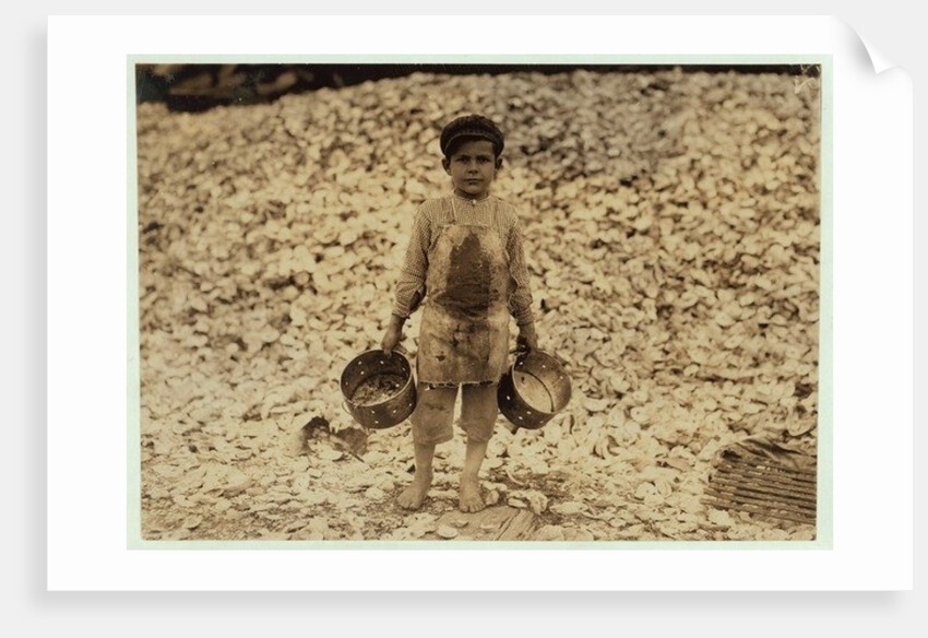 5 year old migrant shrimp-picker Manuel in front of a pile of oyster shells by Lewis Wickes Hine