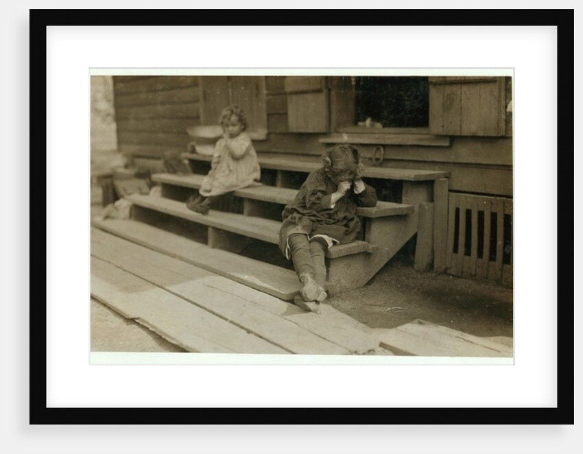 5 year old Olga Schubert began work about 5:00 A.M. helping her mother in the Biloxi Canning Factory, Mississippi, picking shrimps by Lewis Wickes Hine