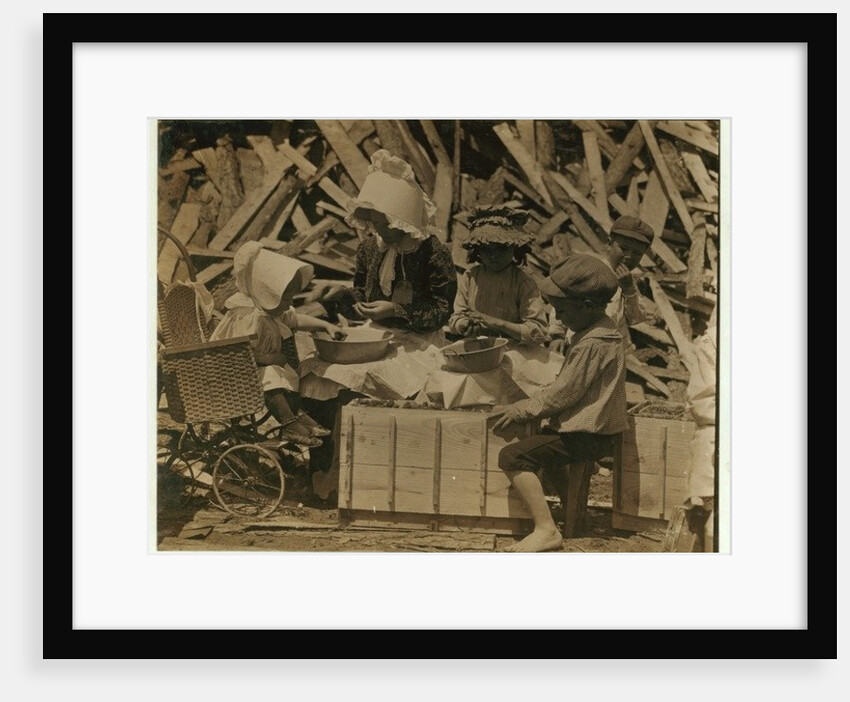 2 year old Cyral hulling strawberries from his cart at Johnson's Hulling Station, Seaford, Delaware, sometimes falling asleep for a few minutes by Lewis Wickes Hine