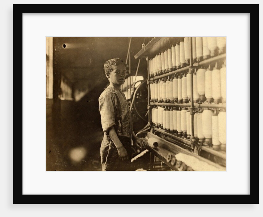 John Dempsey, 11 or 12 years old, Saturday worker in the mule-spinning room at Jackson Mill, Fiskeville, Rhode Island, 1909 by Lewis Wickes Hine