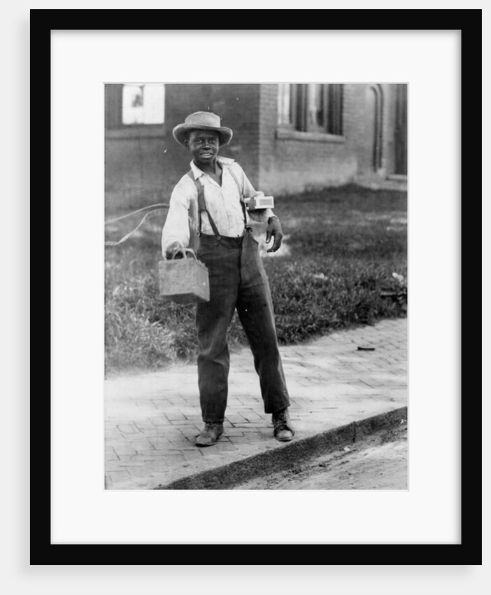 African American shoeshine boy, c.1899 by American Photographer