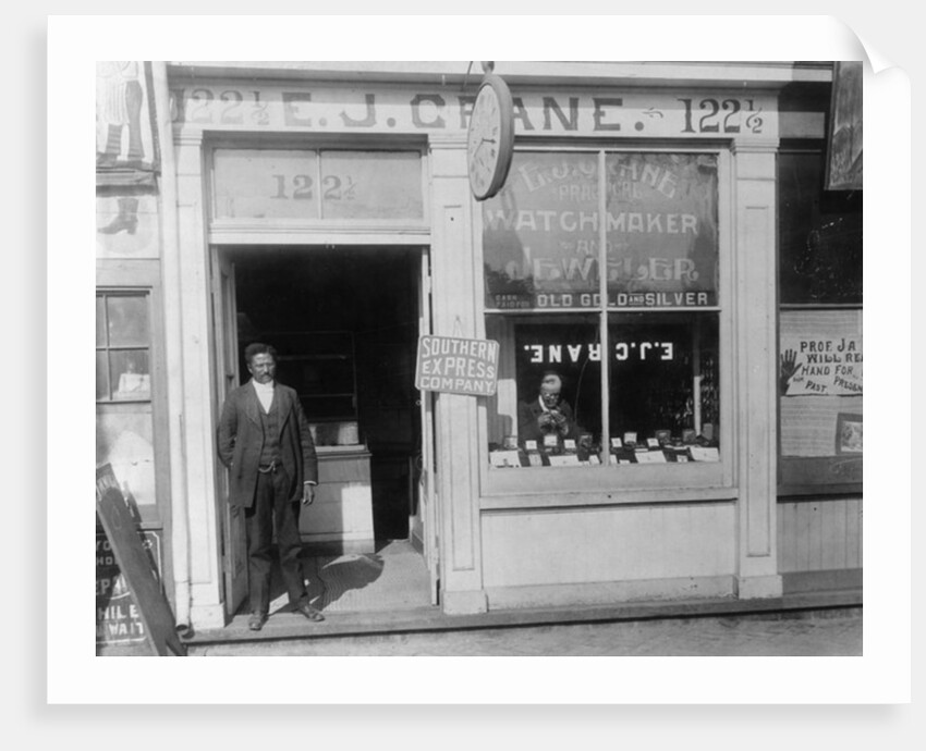 E.J. Crane, watchmaker and jewelry store, c.1899 by American Photographer