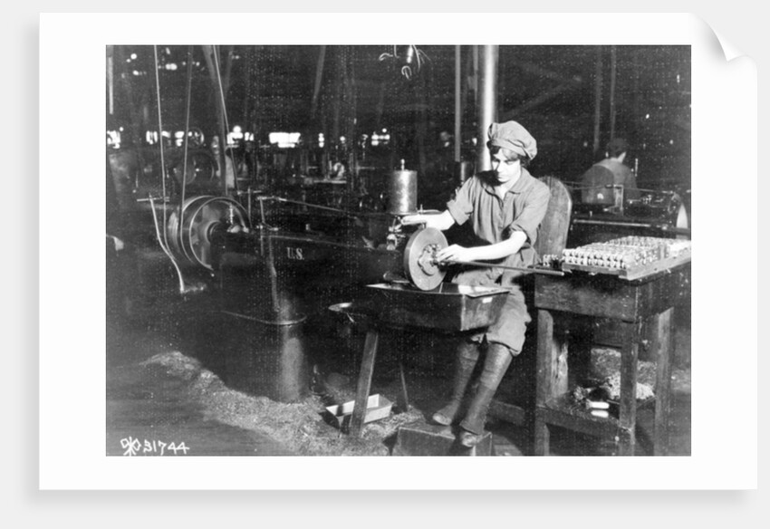 Woman broaching key seat in front sight carrier for rifle, Eddystone Rifle Plant, Eddystone, Pa., during World War I, 1914-18 by American Photographer
