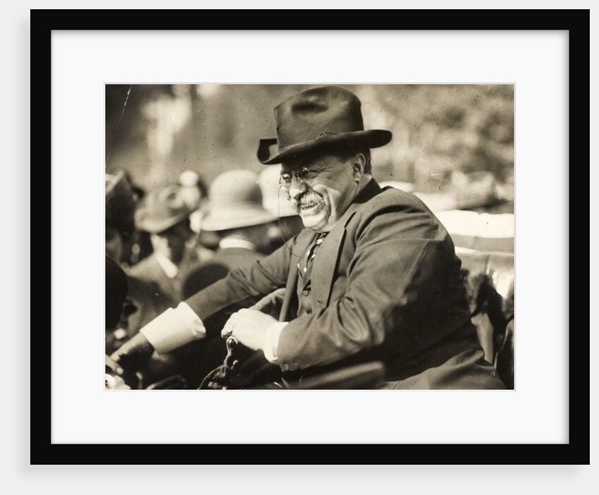 Theodore Roosevelt smiling from an automobile by Anonymous