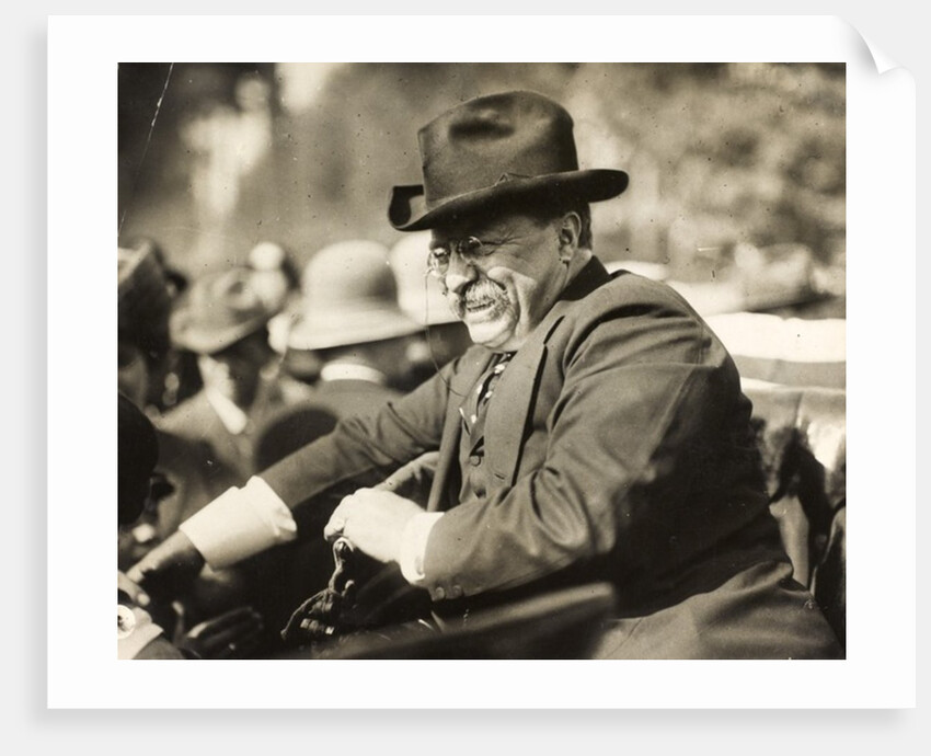Theodore Roosevelt smiling from an automobile by Anonymous