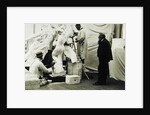 Auguste Rodin in his Paris studio watching the construction of a sculpture, 1905 by Anonymous