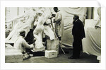 Auguste Rodin in his Paris studio watching the construction of a sculpture, 1905 by Anonymous