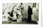 Auguste Rodin in his Paris studio watching the construction of a sculpture, 1905 by Anonymous