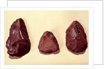 Flint axe heads by Paleolithic Paleolithic