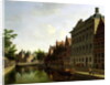 View of the Kloveniersburgwal in Amsterdam, with the Waag, and barge moored in the front of Trippenhuis to the right, 1685 by Gerrit Adriaensz Berckheyde