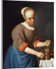 Young girl with a pestle and mortar by Gabriel Metsu