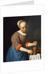Young girl with a pestle and mortar by Gabriel Metsu