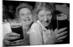 Revellers at Josephine's Nightclub, Barkers Pool, Sheffield, UK. The girls are drinking Pils lager and blackcurrant cordial. 1992. by Bill Stephenson