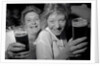 Revellers at Josephine's Nightclub, Barkers Pool, Sheffield, UK. The girls are drinking Pils lager and blackcurrant cordial. 1992. by Bill Stephenson