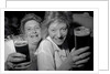 Revellers at Josephine's Nightclub, Barkers Pool, Sheffield, UK. The girls are drinking Pils lager and blackcurrant cordial. 1992. by Bill Stephenson