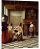 An Interior, with a Woman drinking with Two Men, and a Maidservant by Pieter de Hooch