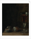 A glass of wine with walnuts on a table by Balthasar Denner