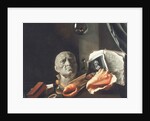 Vanitas still life with a bust, seashells, books and glass flasks by Dutch School