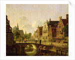 Dutch town scene with canal, figures and a church by Jan Hendrik Verheyen