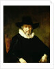 Portrait of a Gentleman wearing a ruff and dark clothes with a wide brimmed hat by Ferdinand Bol
