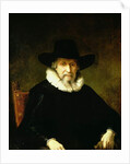 Portrait of a Gentleman wearing a ruff and dark clothes with a wide brimmed hat by Ferdinand Bol