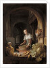 A maid preparing vegetables in a kitchen by Jan Adriansz van Staveren