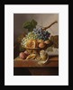 Grapes, an orange and walnuts in a wicker basket with a lemon and plums, all on a marble ledge by Johannes Cornelis Bruyn