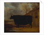A black bull standing by a cowshed, an extensive landscape beyond by James Pollard