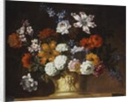 Tulips, snowballs and other flowers in a sculpted urn on a ledge by Pieter Casteels