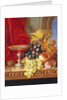 Grapes and a peach with a tazza on a table at a window by Edward Ladell