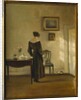 An Interior with a Woman feeding a Cat by Carl Holsoe