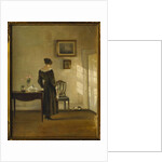 An Interior with a Woman feeding a Cat by Carl Holsoe