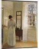 A Lady looking in a Mirror by an Open Door by Carl Holsoe