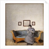 Ida Hammershoi sitting on a sofa by Vilhelm Hammershoi
